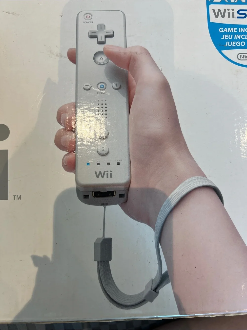 Nintendo White Wii Remote with 4 Controller from 2006
